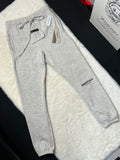 FORMLESS SS22 Fear of God Essentials Light Oatmeal Oversized Fleece Sweatpants | Streetwear