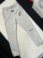 FORMLESS SS22 Fear of God Essentials Light Oatmeal Oversized Fleece Sweatpants | Streetwear