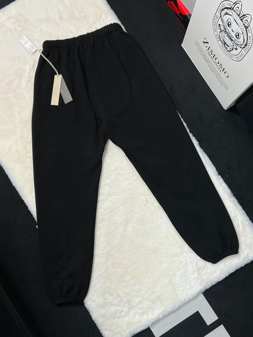 Fear of God Essentials Oversized Fleece Sweatpants - Black (FW24) | FORMLESS